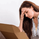 A woman clearly disappointed with an ecommerce order she just opened
